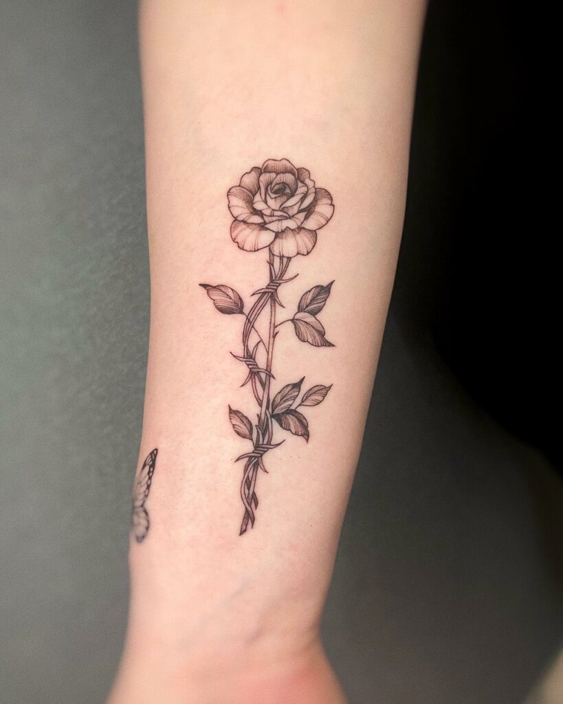 Simple Rose Tattoo With Thorns