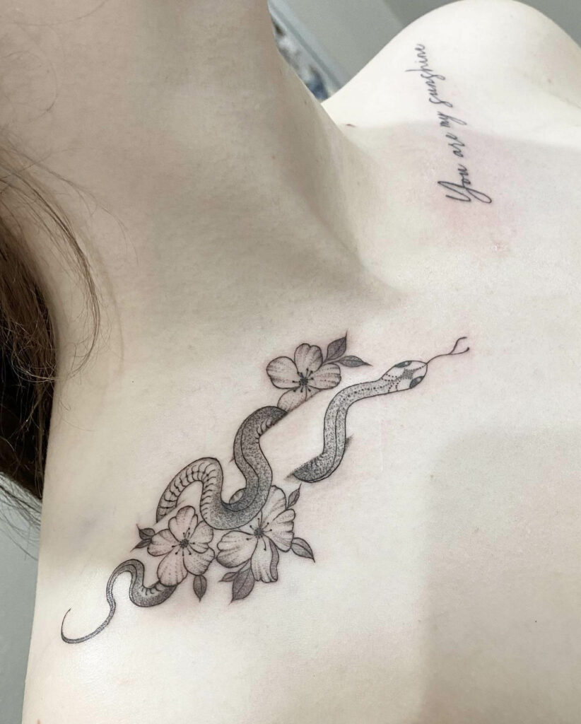 2 snakes added today by Georgia at Black Diamond in Romford UK also the  rose was touched up   rtattoos