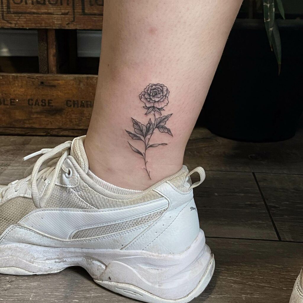 Minimalistic Rose Thorns Tattoo