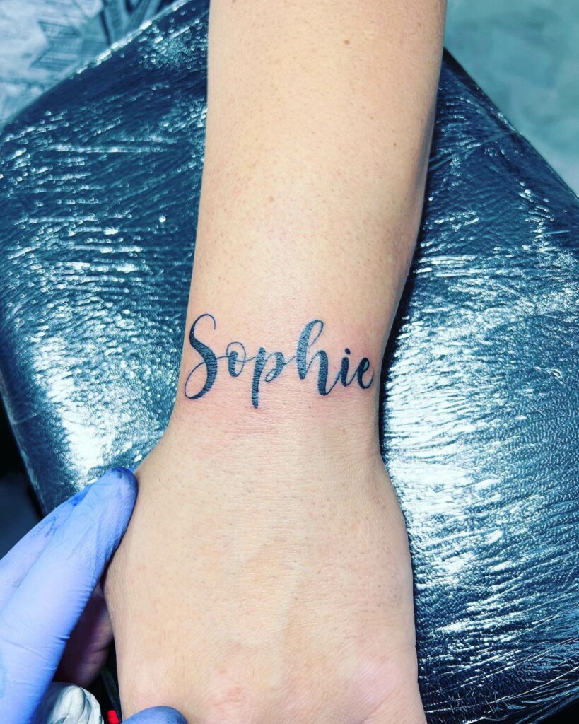 Bold Letter Name Tattoo