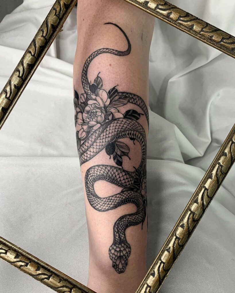 Snake On Hand Tattoo