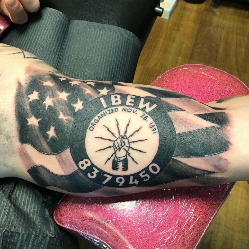 Symbolic Lineman Tattoo With American Flag