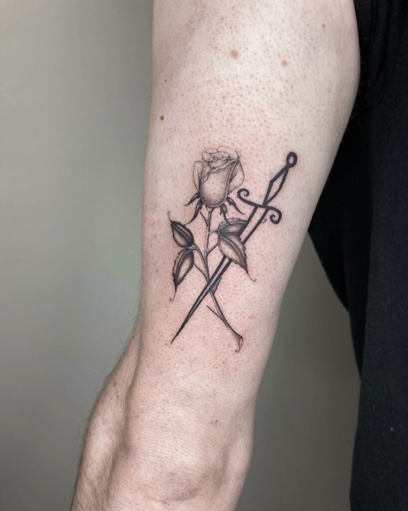 Black Dagger Tattoo With A Rose