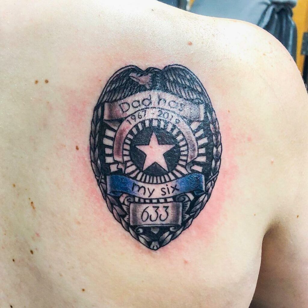 A Correctional Officer Badge Tattoo