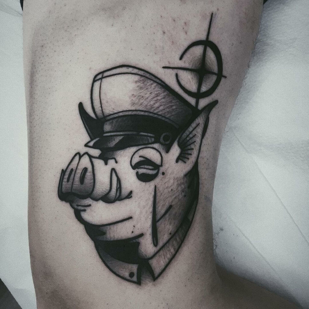 A Cute Piggy Correctional Officer Tattoo