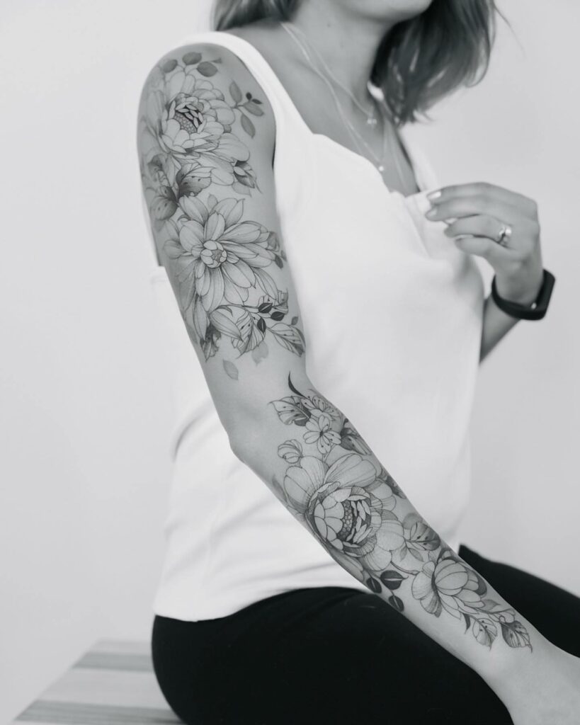 A Full Sleeve Unique Floral Tattoo
