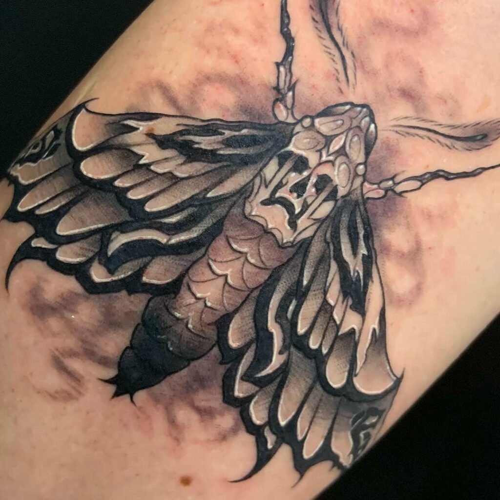 Abstract Black Eyed Death Moth Tattoo
