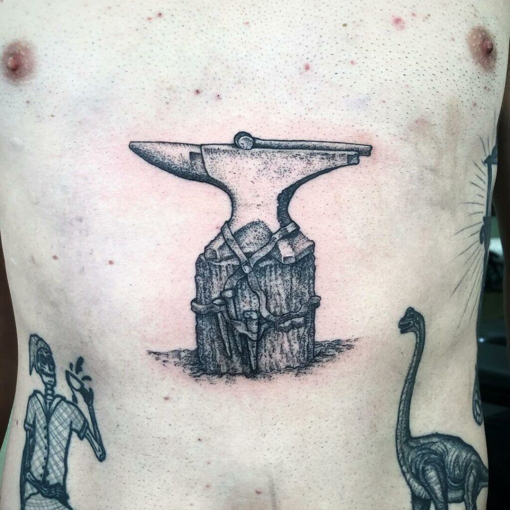 An Anvil Tattoo As An Addition To Other Design