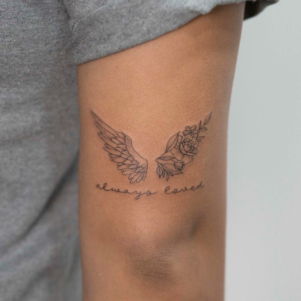 Angel Wing Tattoo On The Back Arm