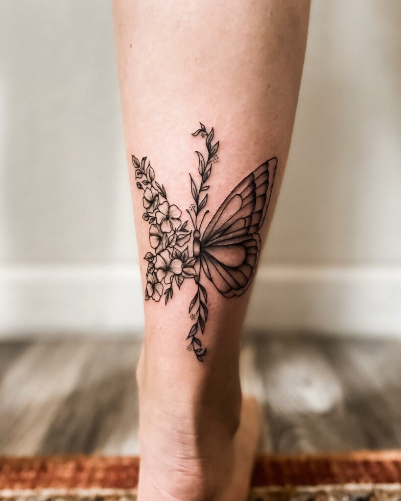 Ankle Butterfly Tattoo With Ferns and Petals