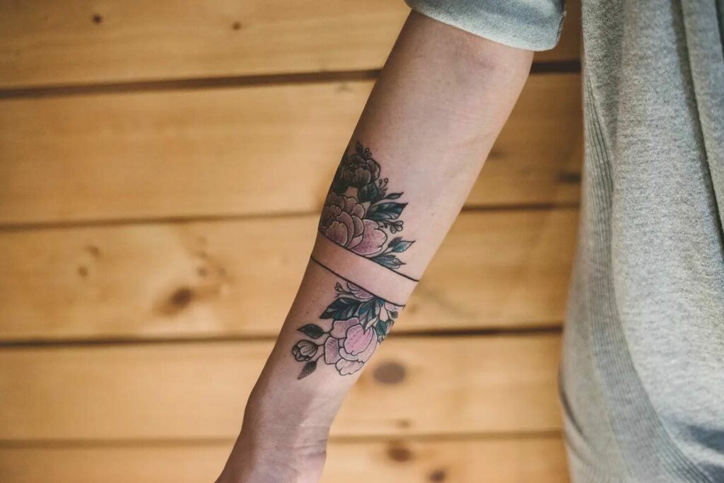 flower tattoos on outer forearmTikTok Search