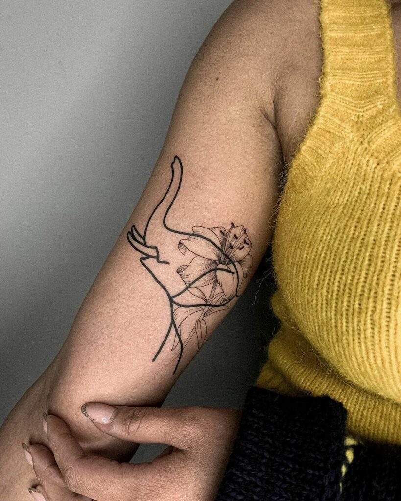 Elephant Single Needle Tattoo With Flower Design On Hand