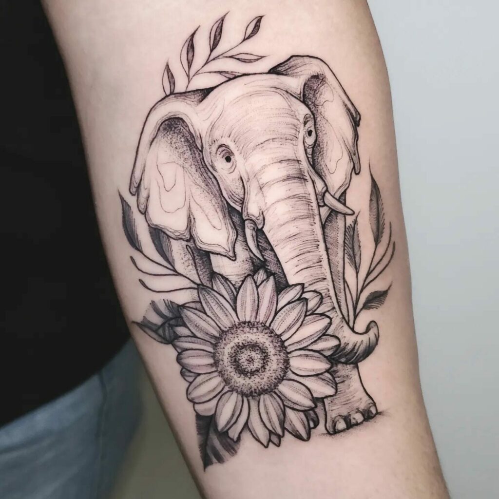 Elephant Tattoo Designs With Flowers On Hand