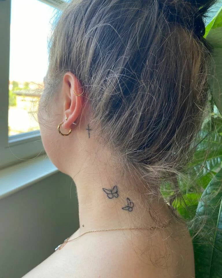 Small Black Neck Cross Tattoo