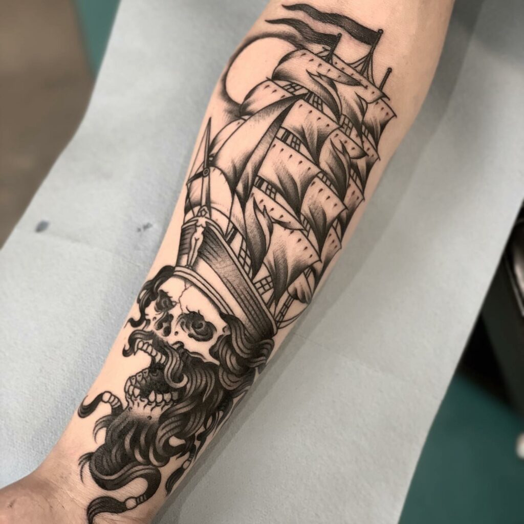 Arm Tattoo of a Dangerous Pirate Ship