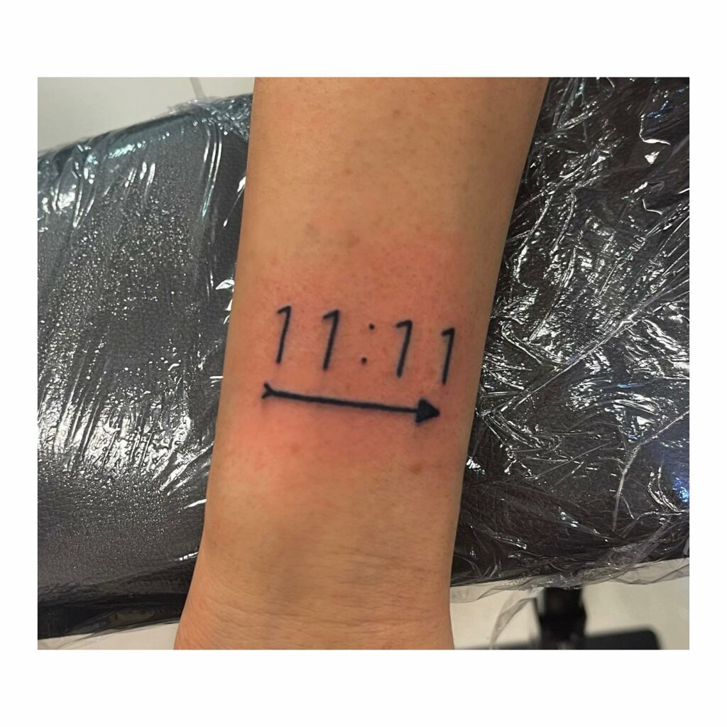 Arrow And 11 11 Tattoo On Wrist