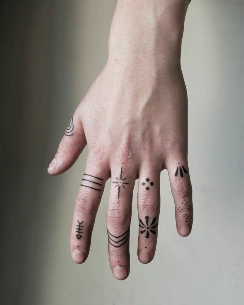 Awesome Ideas For Tiny Handpoked Finger Tattoos