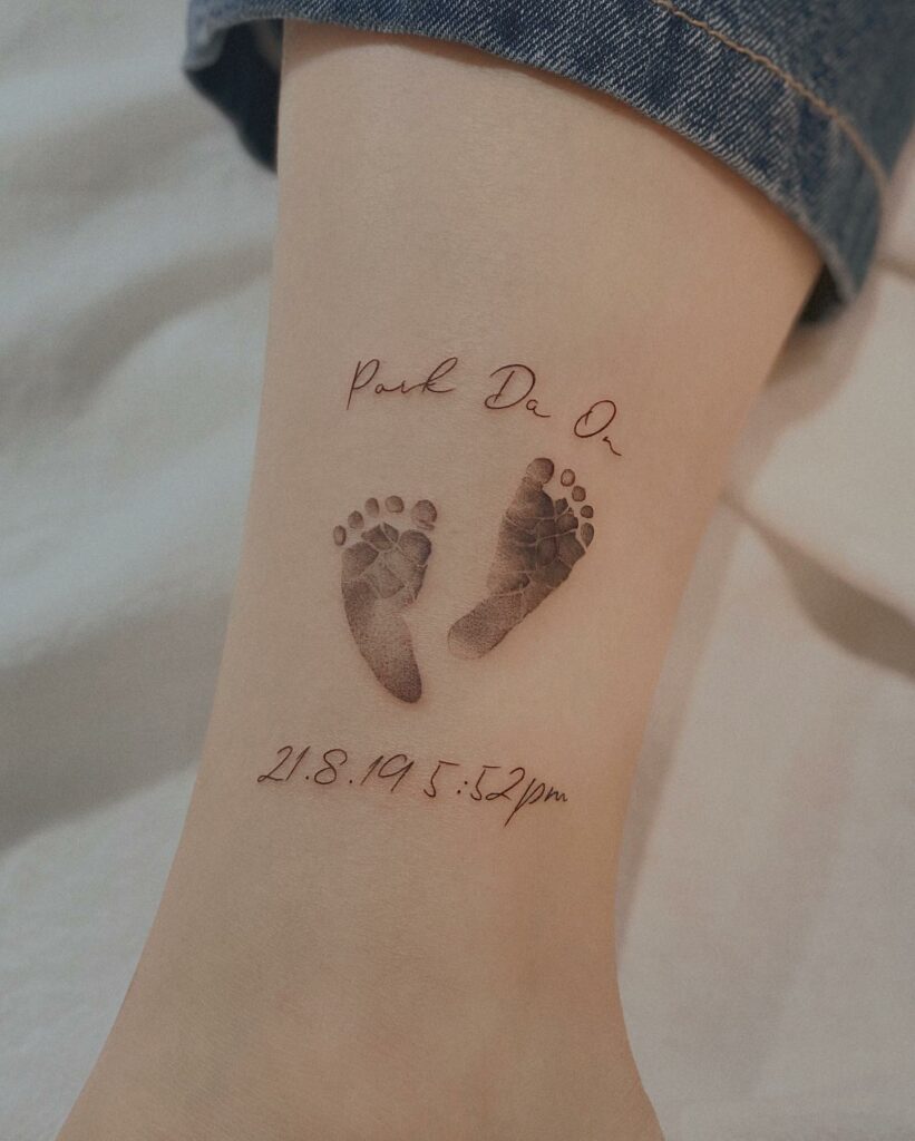 baby footprint tattoos on foot