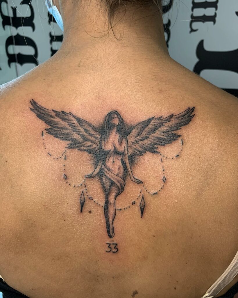 11 Female Protector Guardian Angel Tattoo Ideas That Will Blow Your Mind   Beautiful Guardian Angel Tattoo 819x1024 