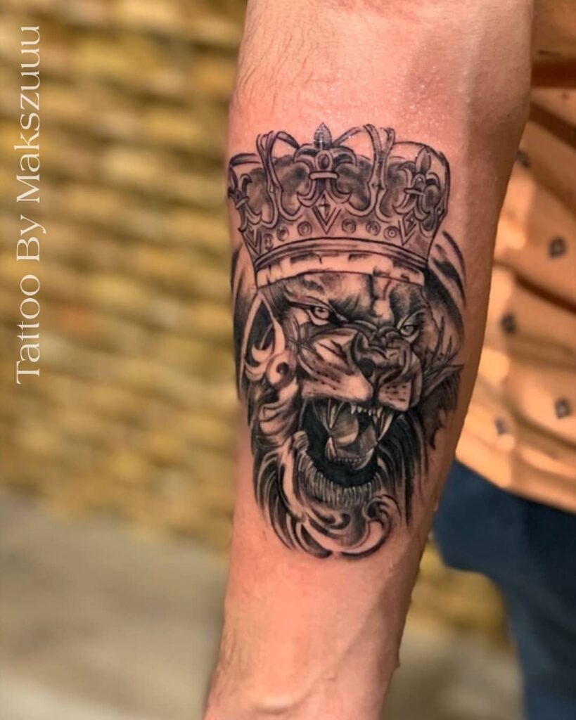 Beautiful Lion Crown Tattoo On Forearm