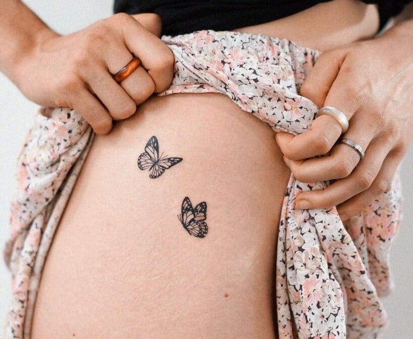 Tiny flower bundle tattoo on the thigh  Tattoogridnet