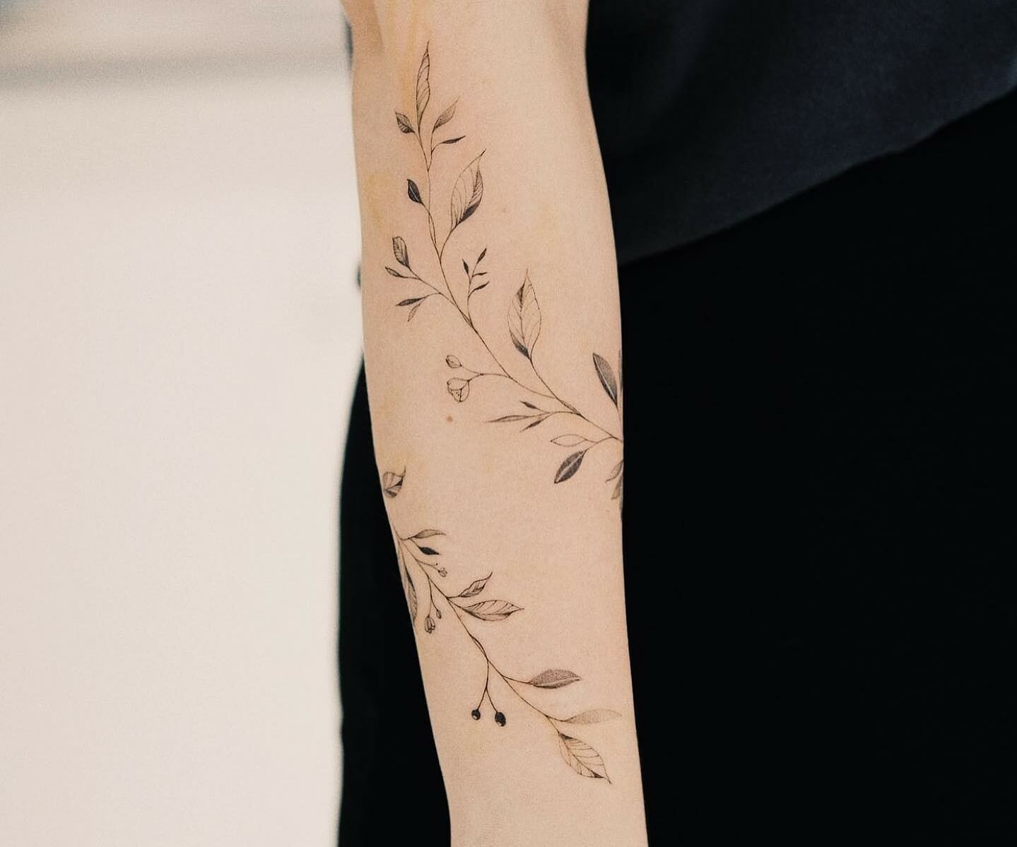Pictures of flower vine tattoos