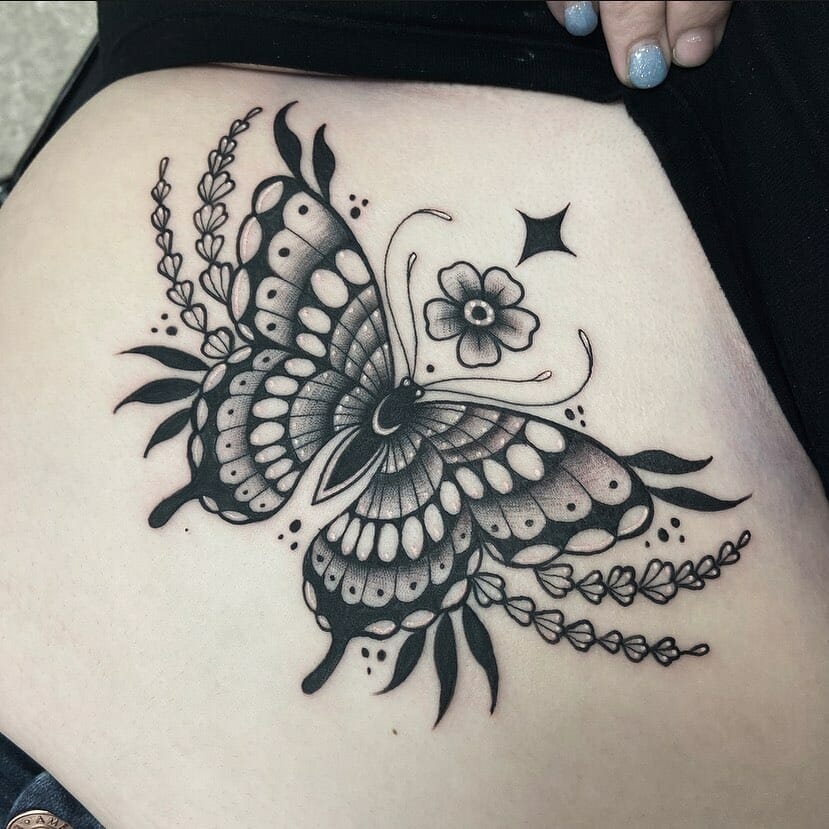 Black And Grey Ink Sternum Tattoo Of A Butterfly