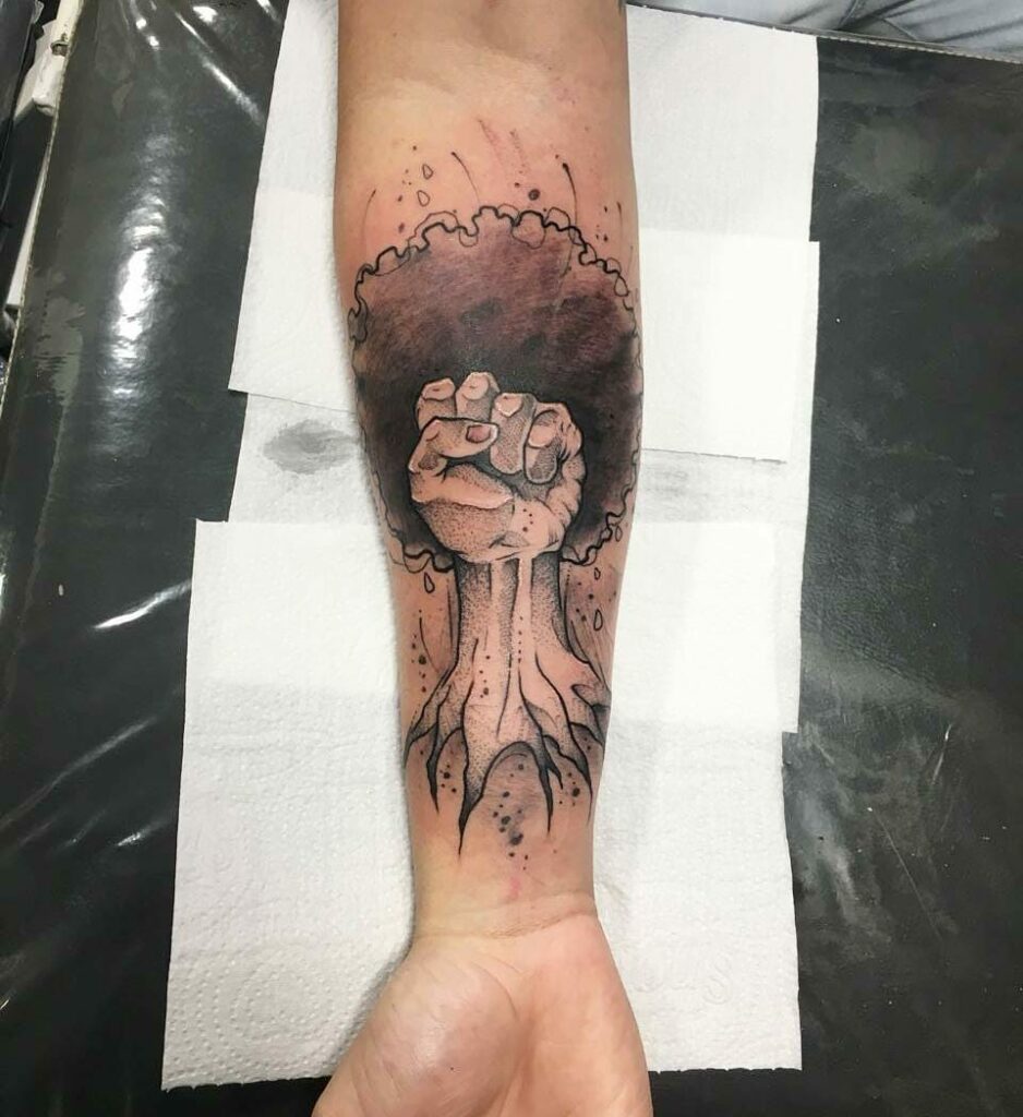 Black Power Fist Tattoo Inspired By Tree Roots