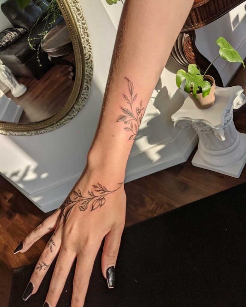 flower vine with sun spine tattooTikTok Search