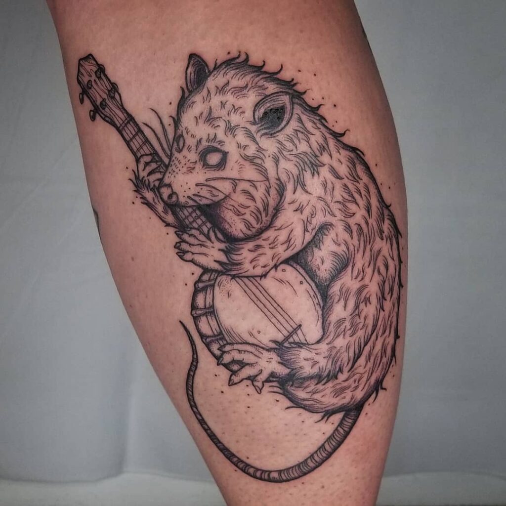 Blackwork Banjo Opossum Tattoo