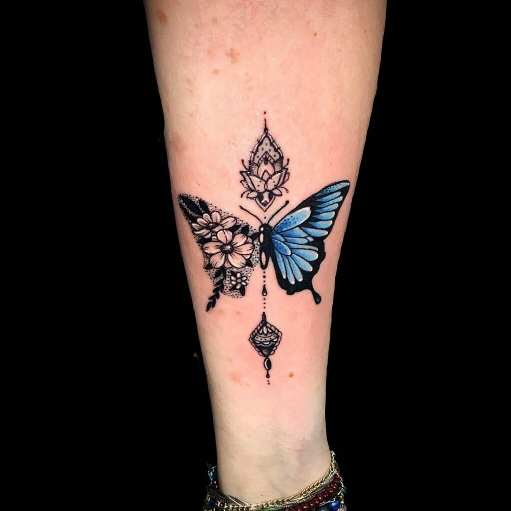 Tattoo uploaded by alex panda  Small butterfly design with flowers black  worksimple and clean  Tattoodo