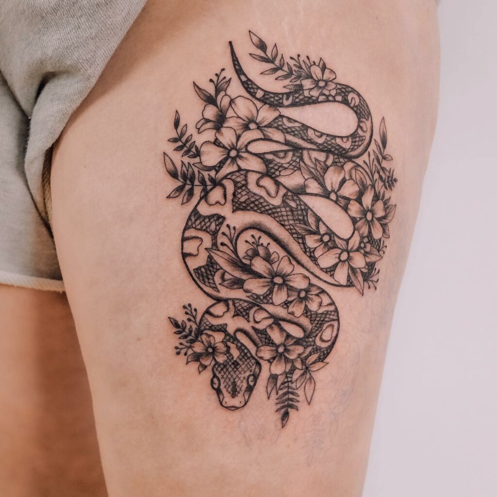 Tattoo uploaded by Vyxi Woo Tattooer  Snake  flowers hip tattoo done by  vyxiwootattooer vyxiwootattooer Instagram vyxiwootattooer   singapore singaporetattoos vyxiwoo vyxiwootattooer snake snaketattoo  hiptattoo thightattoo flowers 