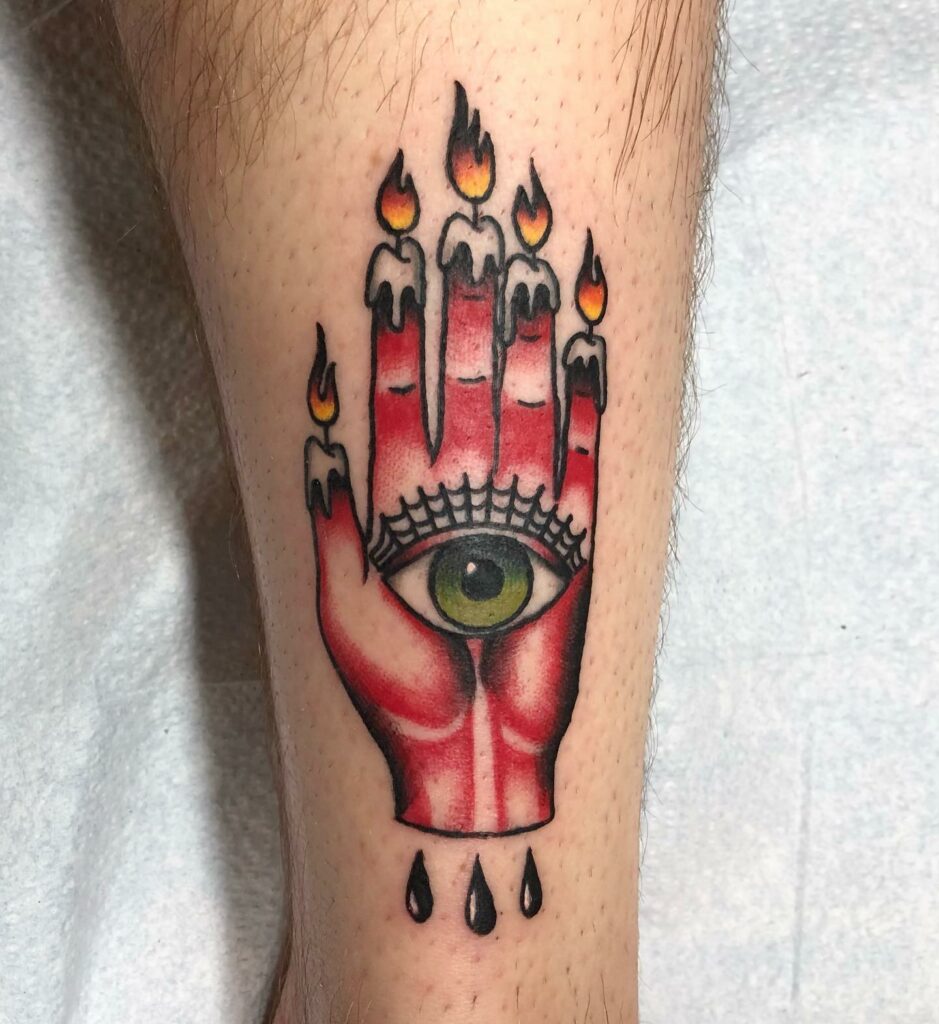Bright Red Hand Of Glory Tattoo