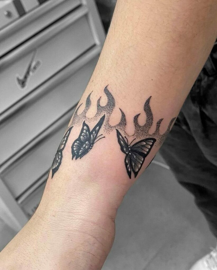 Butterfly on Flame Tattoo