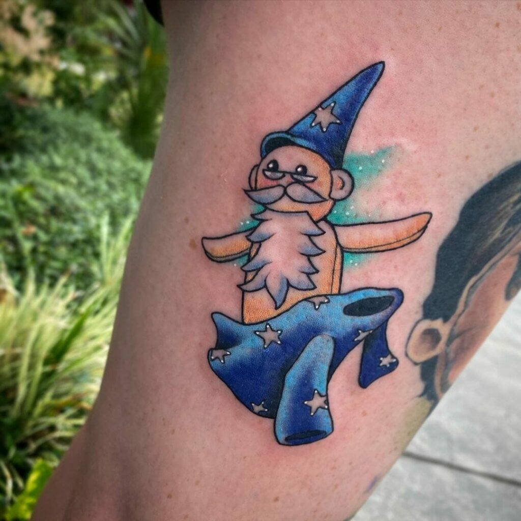 Cartoon Themed Miniature Dumbledore Tattoo