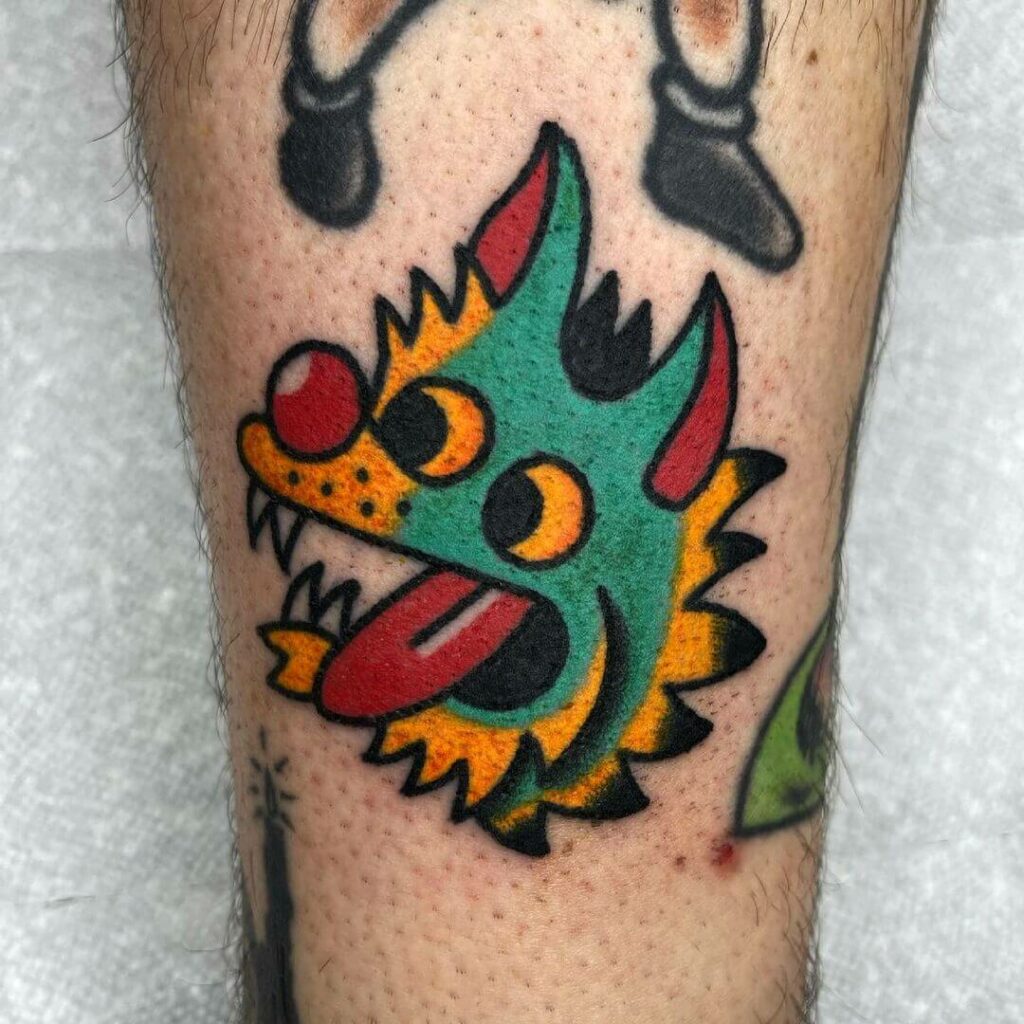 Cartoon Wolf Head Tattoo