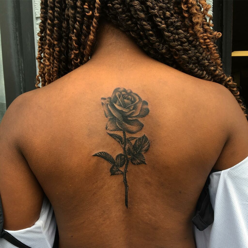 Classic Rose Tattoo With Stem On The Back