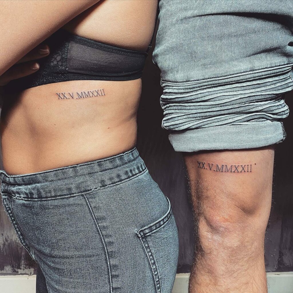 Couple's Roman Numeral Chest Tattoo