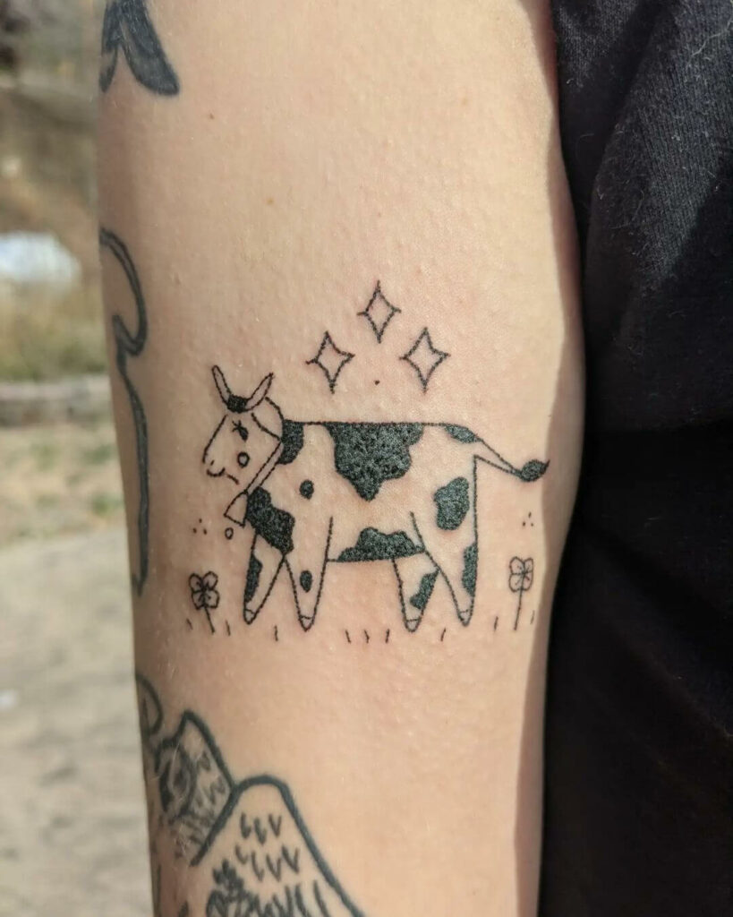 Cow In the Garden Tattoo