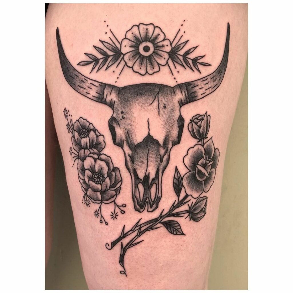 Premium Vector  Skull of a cow with horns decorated with flowers