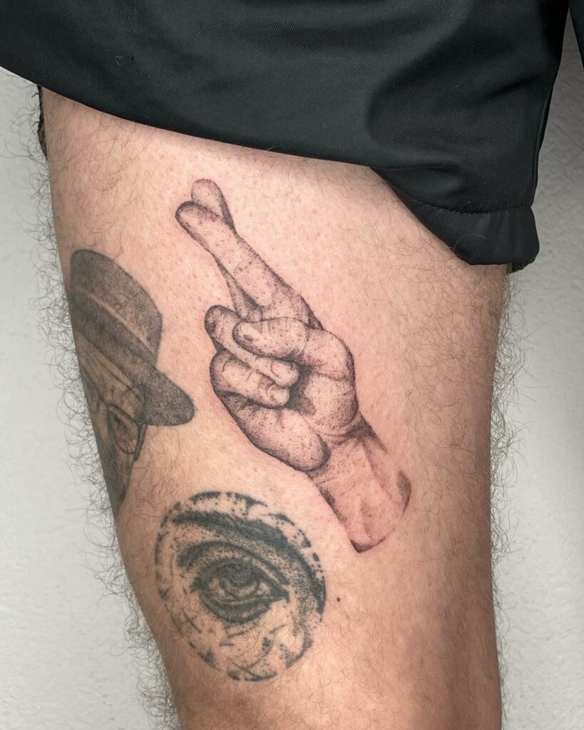 Cross Tattoo On Finger