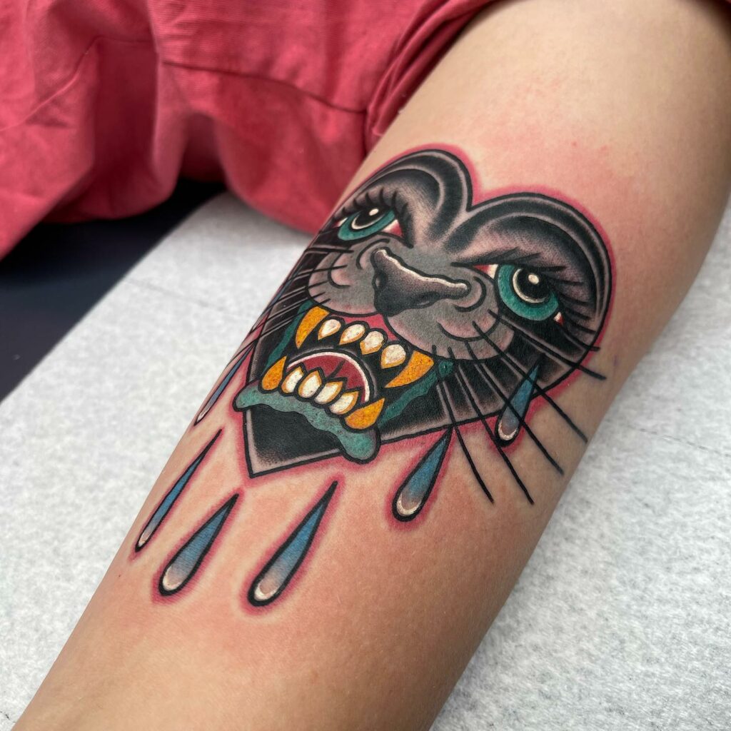 Tattoo uploaded by Tattoodo  Tattoo by Gem Carter GemCarter besttattoos  tattoodoapp appspotlight spotlight best awesome cool color  traditional panther pinkpanther hearts love  Tattoodo