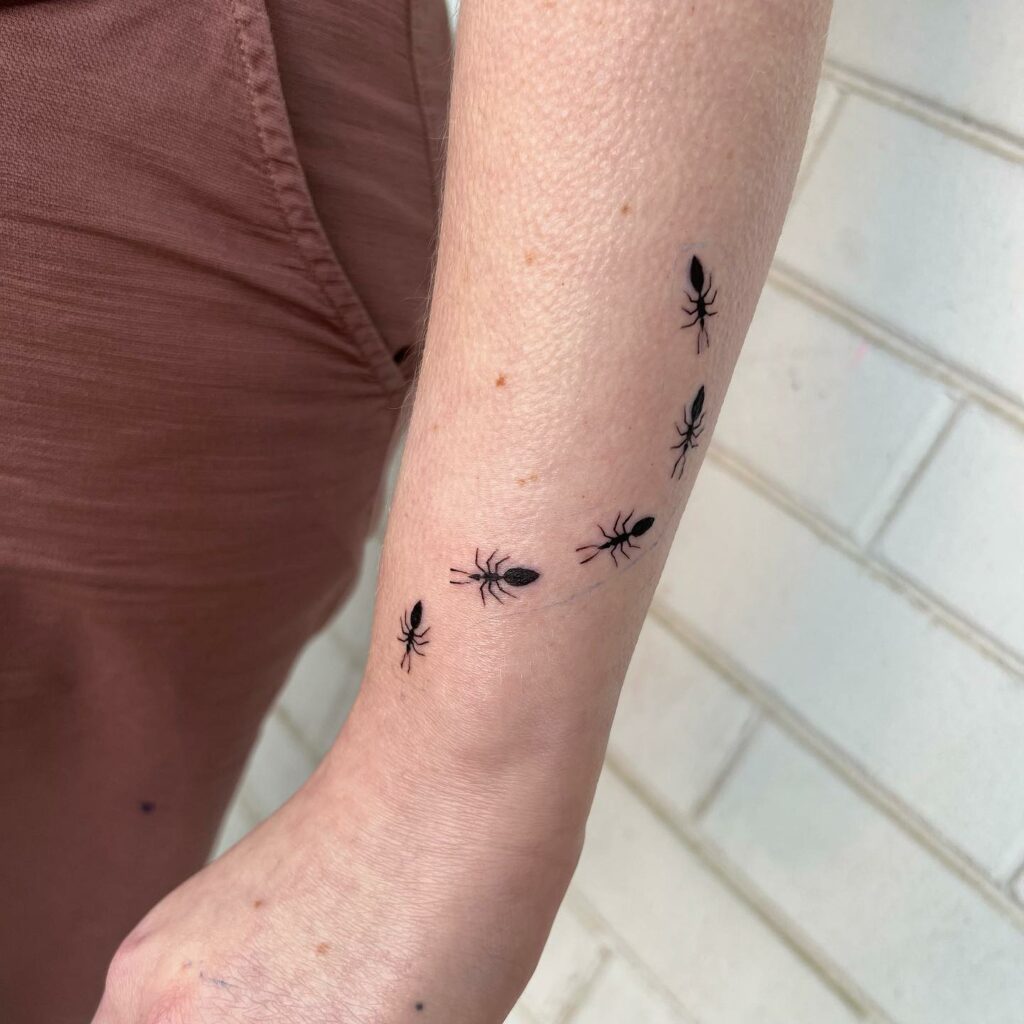 Curvy Ant Tattoo