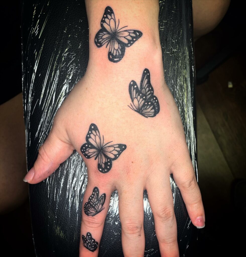 Butterfly Finger Tattoo