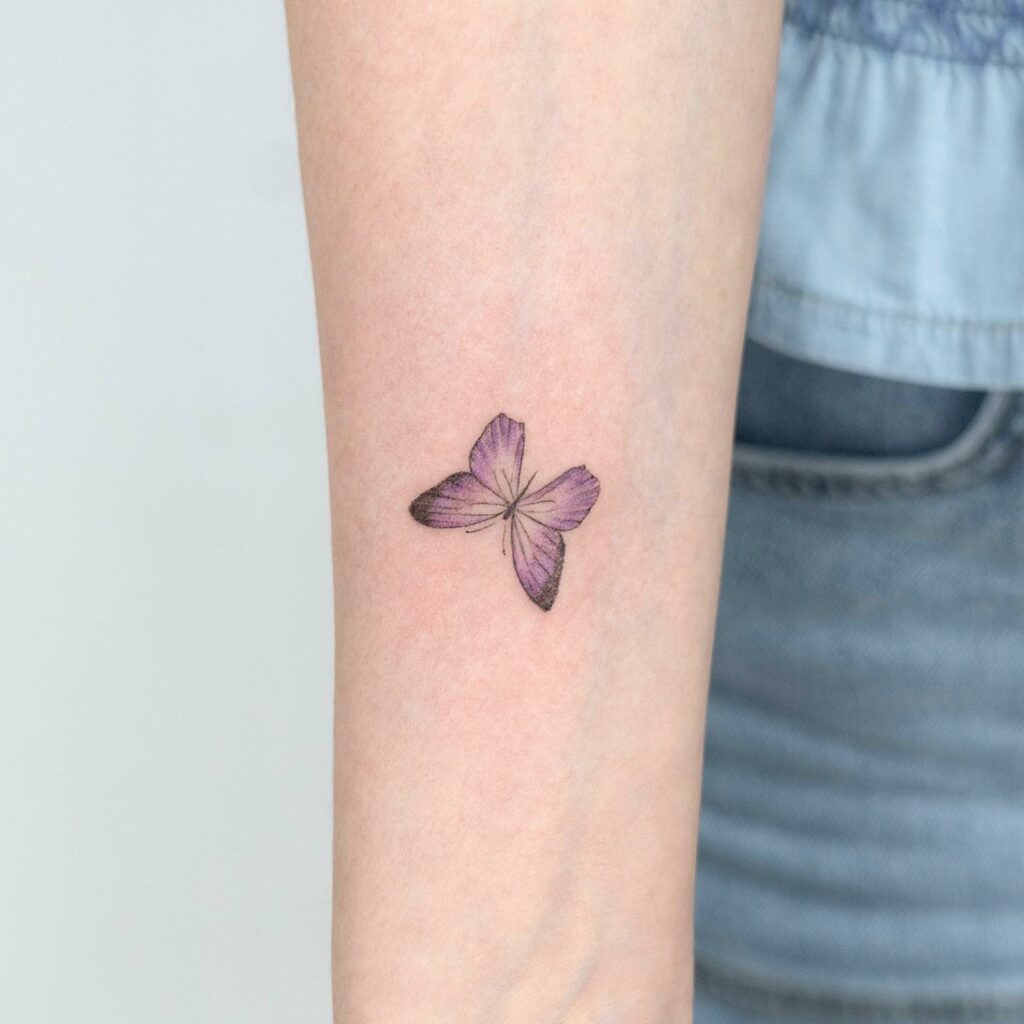Cute Butterfly Tattoo In Blacks ideas