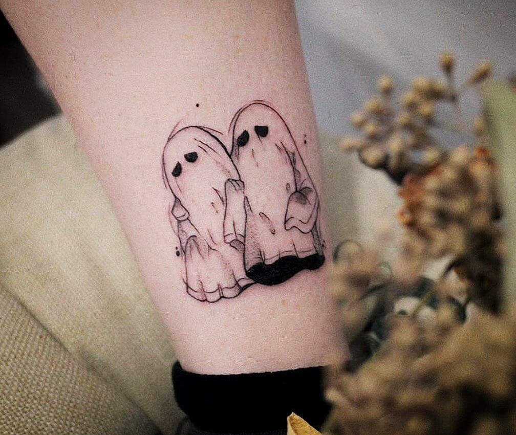 Cute Tiny Ghost Tattoo Designs