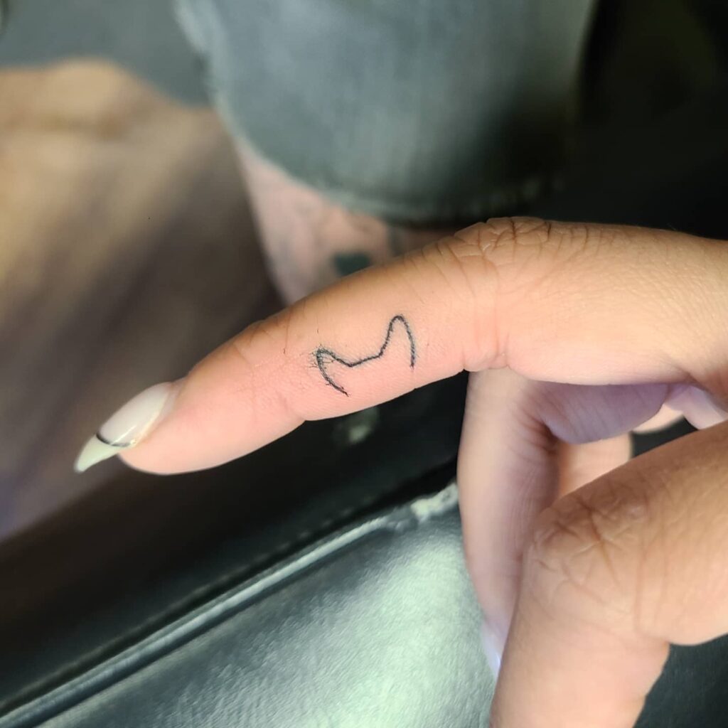 Dog Ear Finger Tattoo ideas