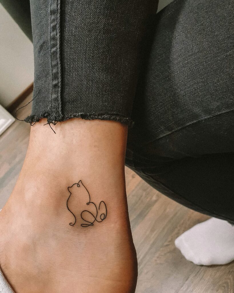 Dog Outline Ankle Tattoo