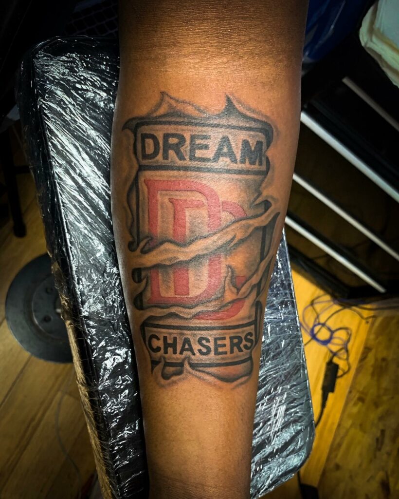 lil snupe arm tattoo