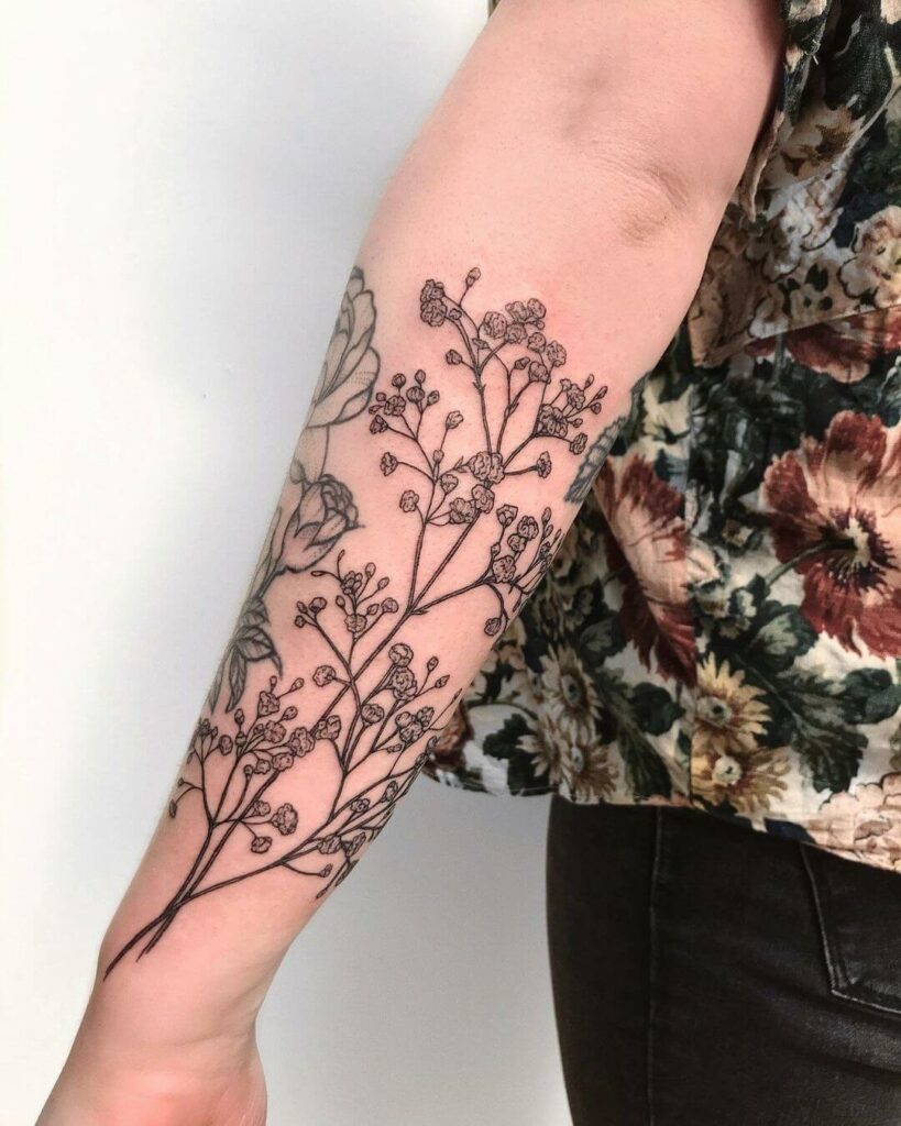 Elaborate Forearm Baby's Breath Tattoo